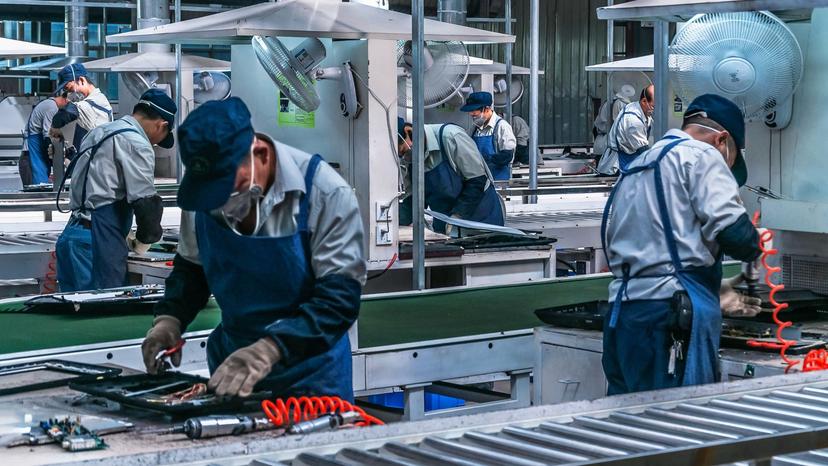 Skilled workers on assembly line
